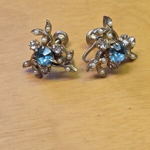 Vintage clip on gold tone earrings with faux pearl accents